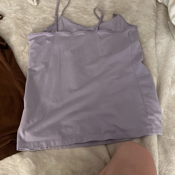Brown one from gap and a size small. Purple one is time and tru size medium. - Picture 3 of 5